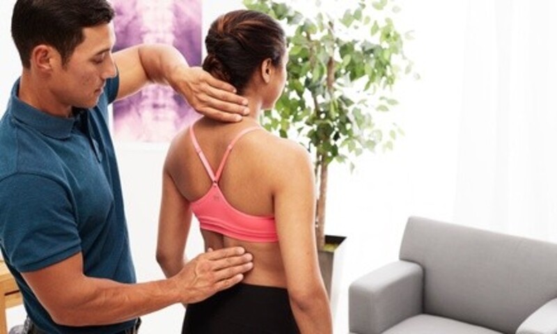 Evaluation with One or Two Adjustments, Rapid Release, and Cold Laser Sessions at Wellness Joint (Up to 90% Off)