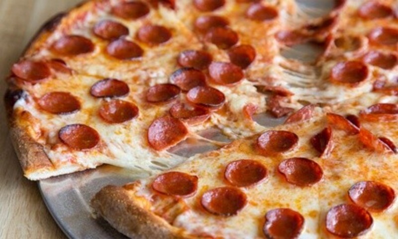 Pizza, Garlic Knots, and More at Sal's NY Pizza (Up to 43% Off). Three Options Available.