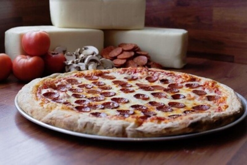Pizza, Wings, Subs, and More at Mike's Subs (Up to 36% Off). Three Options Available.