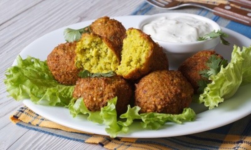 Mediterranean Cuisine at Boostan Cafe, Dine-In, Carryout, and Delivery (Up to 50% Off). Three Options Available.