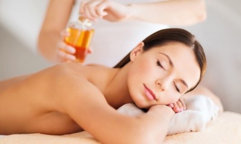Therapeutic Hot Stone Massage Package with optional Facial